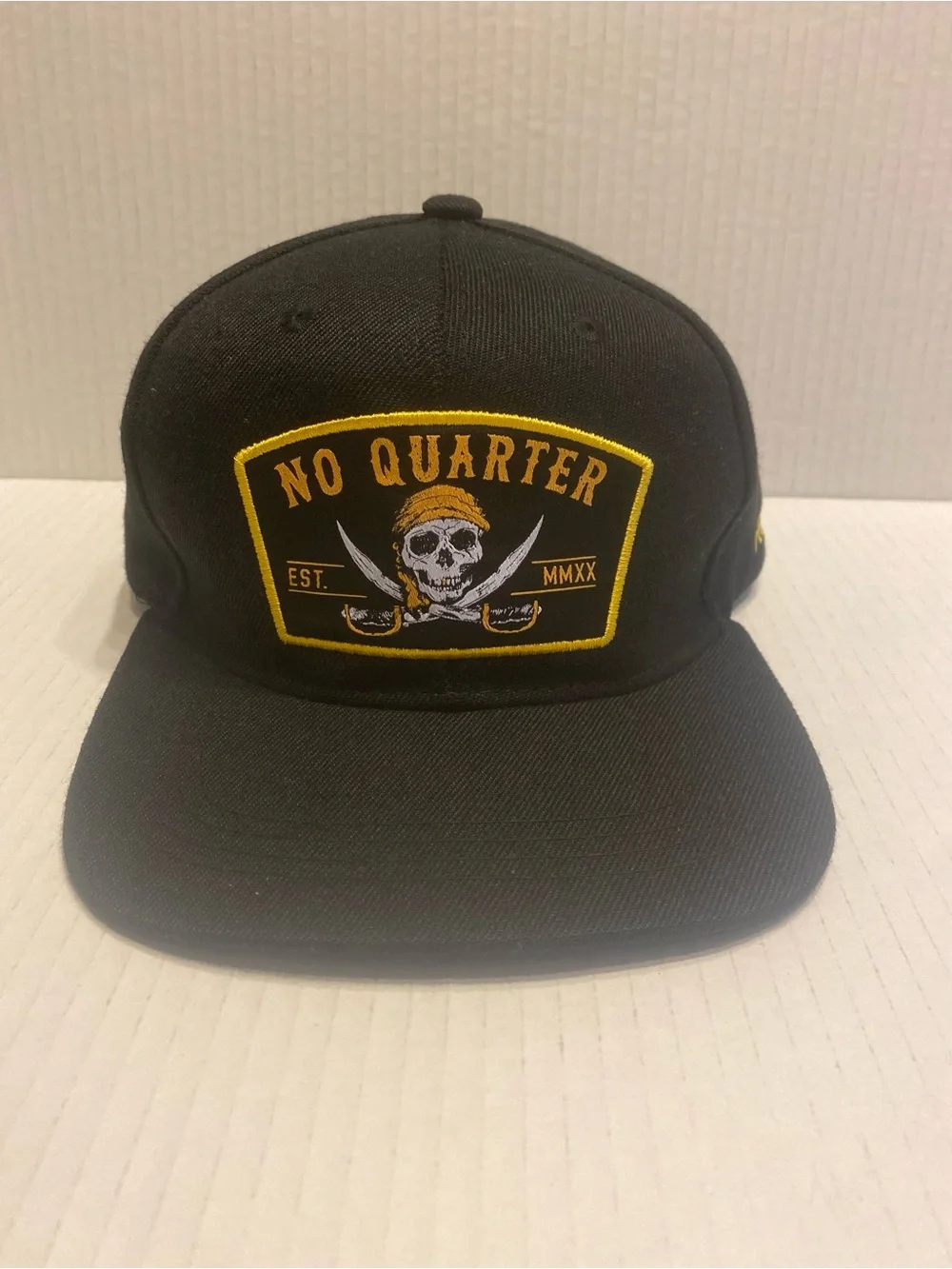 No Quarter Black & Gold Skull Patch Snapback Hat